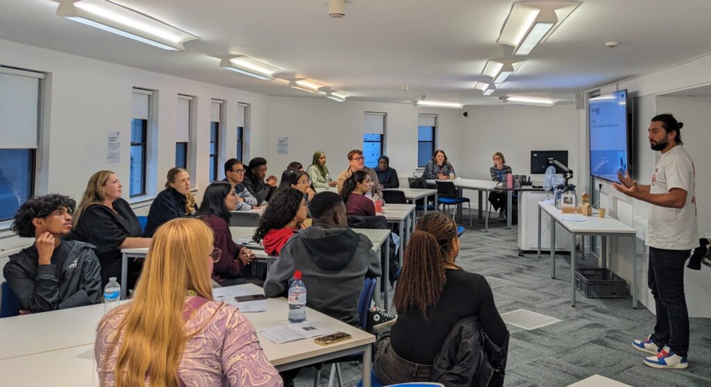 Tier Blundell, founder of Excluded from School, delivers training to a group of professionals.
